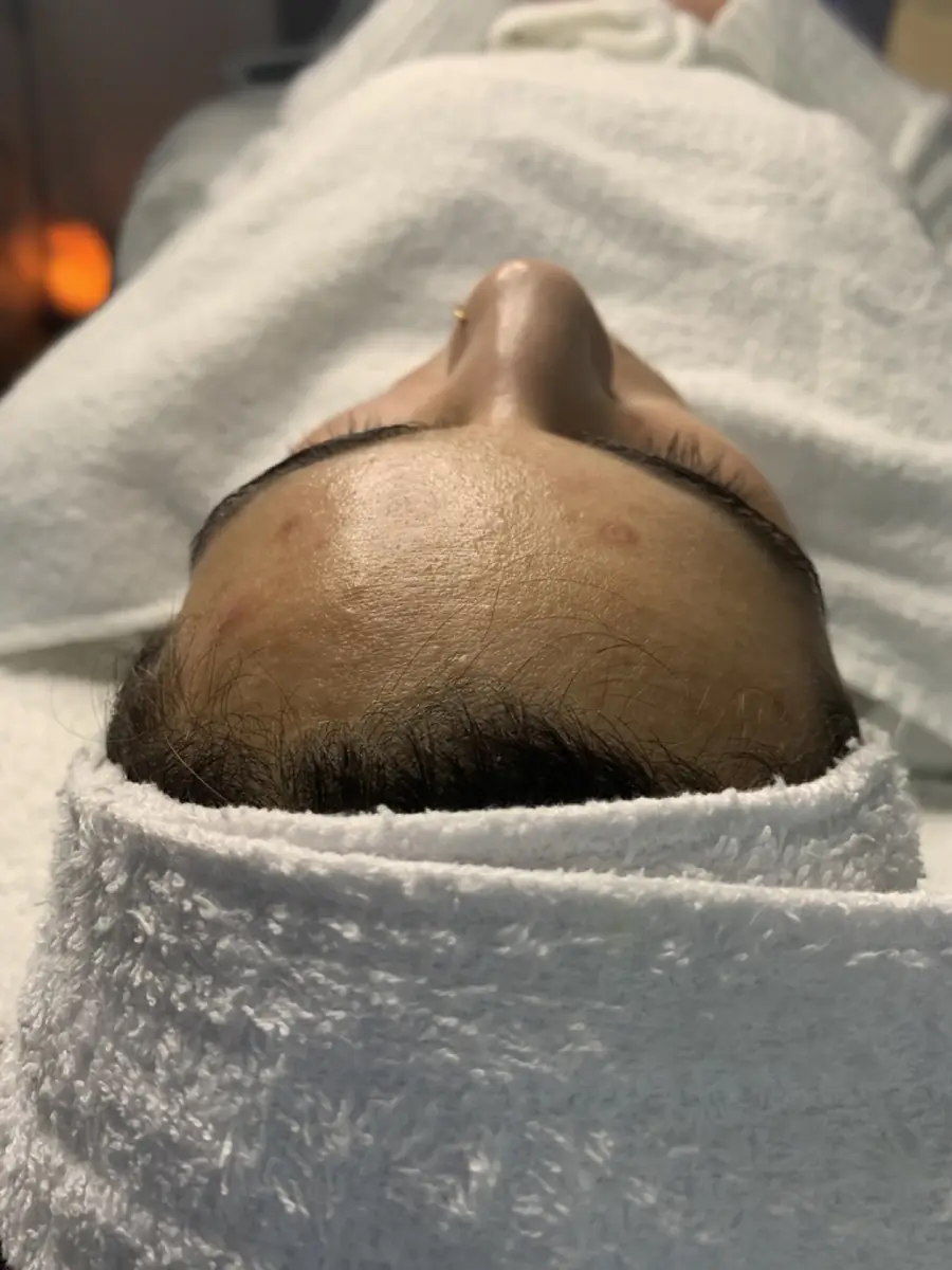 A client prepared for a facial