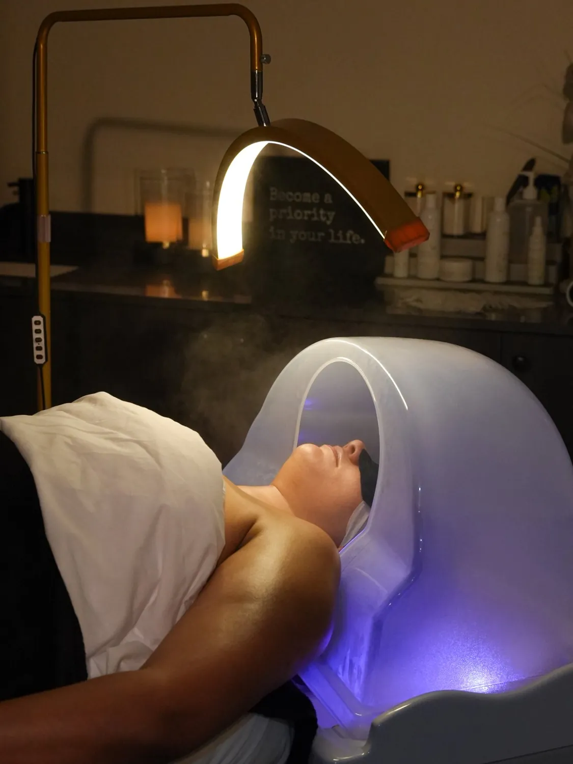 Head spa, under the light at Skinholic Aesthetics & Laser, Surrey.